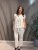 Amy - Blus med knyt och volang - Beige