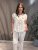 Amy - Blus med knyt och volang - Beige