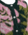 Grön och rosa kofta med blommor
