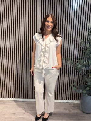 Zoom bild av Amy - Blus med knyt och volang - Beige
